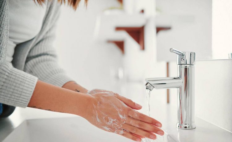 GettyImages-Woman-washing-hands-Jay-Yuno