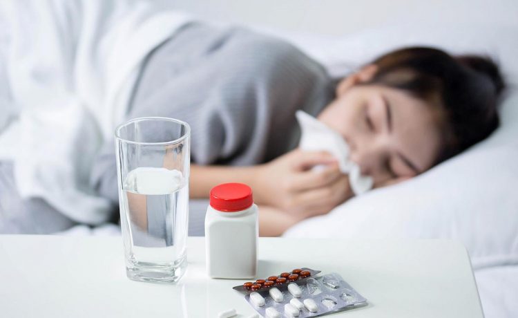 sick-woman-with-flu-Shutterstock