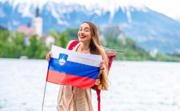 woman-traveling-bled-slovenia-young-female-tourist-slovenian-flag-standing-near-lake-popular-tourist-destination-promoting-75158760